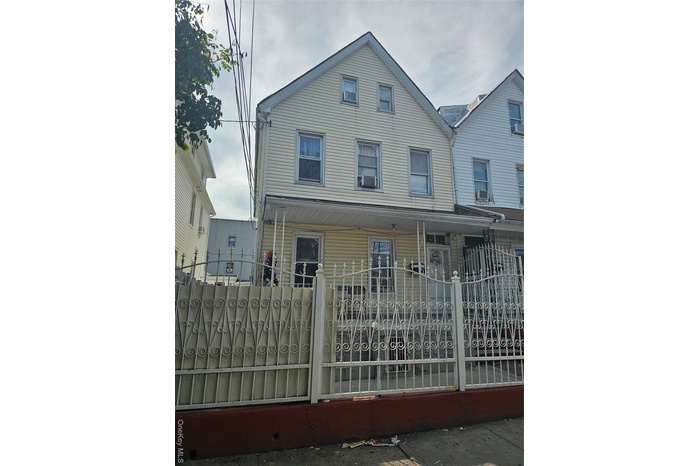 View of front of home with a fenced front yard