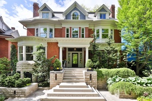 Architectural Digest quality with a 2 storey coach house, double car garage, circular drive and parking for 7 cars.