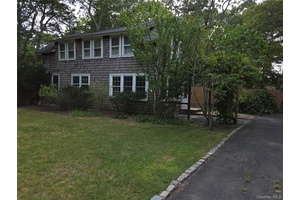 Westhampton Beach Village location offers Beach Access from this 2 unit home, freshly carpeted and painted 3 bedroom 2 bath downstairs with fireplace and washer dryer.