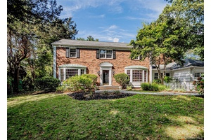 Expanded Colonial on shy half acre at the gateway to Lloyd Harbor.