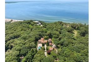 Exquisite Tuscan Inspired Estate Just Steps from the Beach.