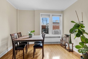 Beautiful and sizable top floor pre war 1 bedroom with over 850 sqft, king sized bedroom and a separate dining area !
