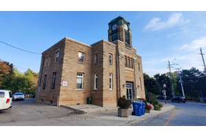 MULTI RESIDENTIAL INVESTMENT OPPORTUNITY Majestic Post Office with 11 residential apartment building, featuring high ceilings, elegant baseboards and large windows.
