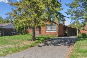 Welcome to this charming west end brick bungalow offering 2 1 bedrooms and 2 full bathrooms.