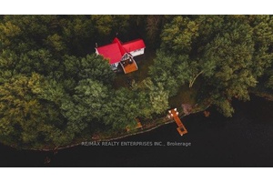 Welcome to your private waterfront escape, where modern luxury meets timeless A frame charm.