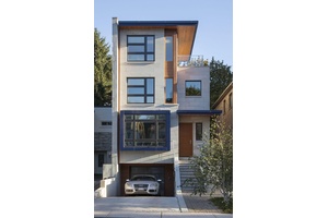 Outstanding architect designed and built home on 4 levels includes a central atrium and an airy 3rd floor Primary suite with 2 decks, a sitting room, skylights, built ins and ...