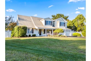 Welcome Home ! This spacious and well maintained 5 bedroom, 3 bath colonial is tucked away on a quiet cul de sac in the renowned Three Village School District.