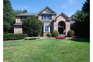 Secluded, inviting and perfectly appointed, this five bedroom brick front colonial on a lushly landscaped acre property offers an exceptional lifestyle in the coveted Half Hollow Hills School District.