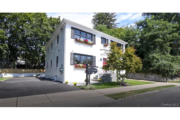 View of front of property with stucco siding