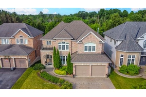 GRANDEUR 2 STOREY HOME WITH NEARLY 4, 000 SQ FT OF FINISHED SPACE IN A PRIME LOCATION BACKING ONTO EP LAND !