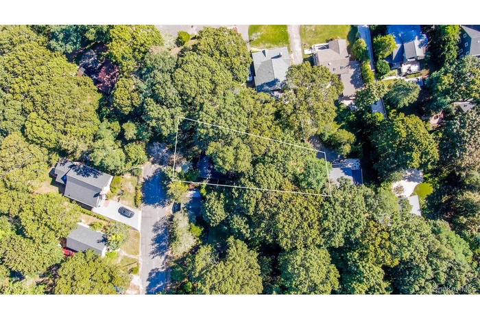 Aerial overview of property's location featuring property parcel outlined