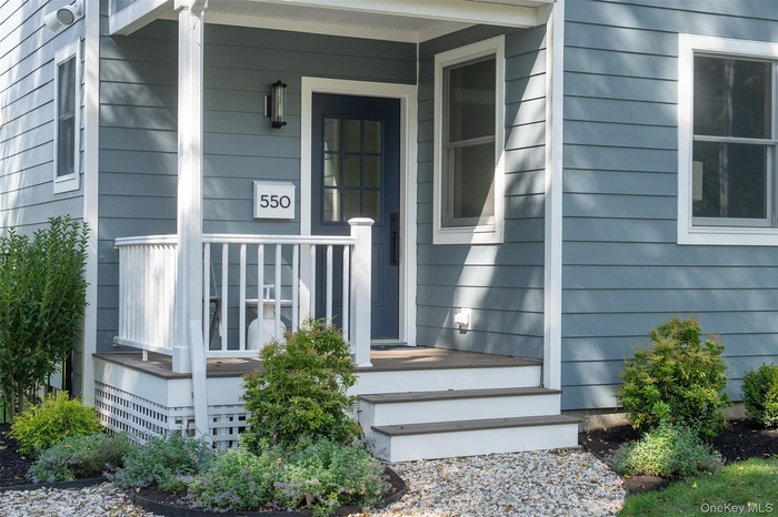 Entrance to property with a porch