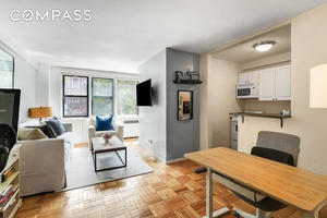 Bright Jr. One Bedroom Flooded with natural light, this cheerful converted alcove studio to a Jr.