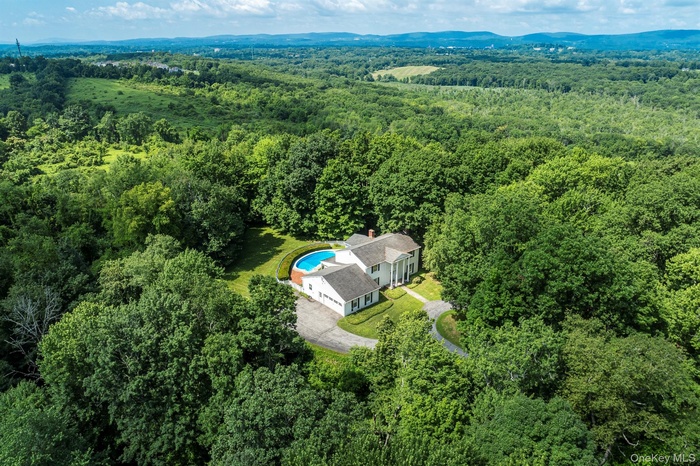 Aerial view of property showing privacy