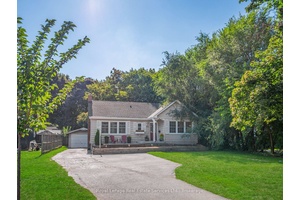 Nestled on an expansive 60x175 ft lot, this delightful bungalow combines space, privacy, and versatility in a coveted Aldershot location, La Salle.