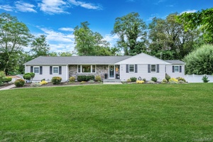 Welcome to this beautifully expanded ranch in the heart of Wading River, where modern updates meet timeless elegance.