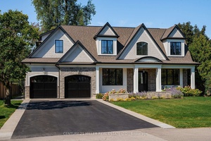 Welcome to 1411 Willowdown Rd, an exceptional custom built residence, designed by Keeren Design, on a oversized pie shape lot in prestigious Southwest Oakville.