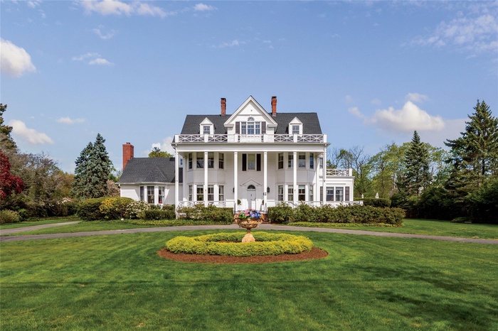 Federal Style Home with Gorgeous Architectural details and grounds.