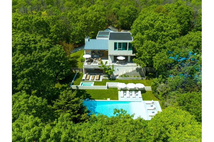 Perched high above on a shy 2 acres