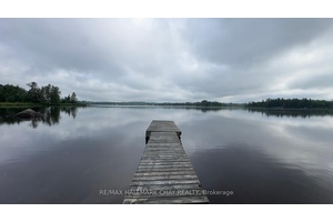 LAKEFRONT LIVING ON BEAR LAKE 102 FEET OF WATERFRONT !