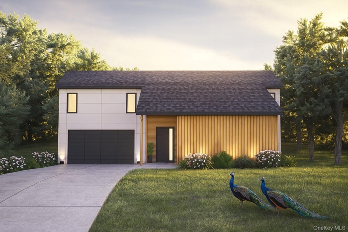 Contemporary house featuring roof with shingles, a front yard, board and batten siding, and concrete driveway