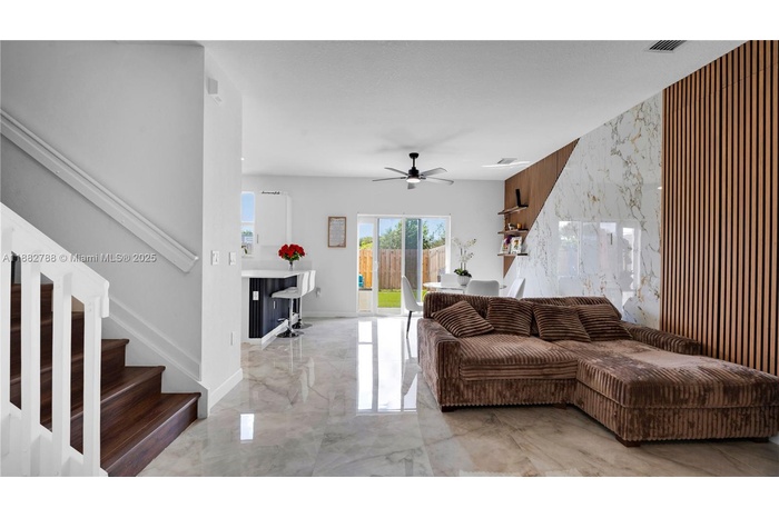 Upgraded vinyl wood flooring flows seamlessly throughout the entire upstairs, including the staircase.