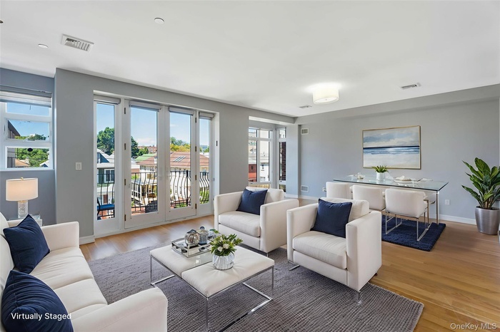 Living area featuring wood finished floors and baseboards