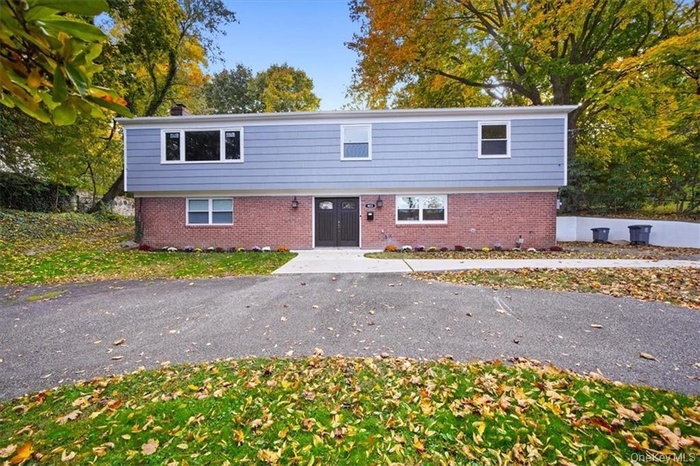 View of front of property with brick siding
