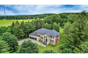 Set on 2. 5 ac. of fully fenced, gated land in sought after Rural King, this arch stunning custom built estate only 2 years old perfectly blends luxury, privacy, and ...