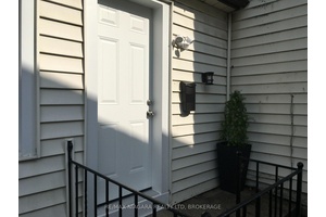 Tiny Bungalow Semi Detached Home with private entry and access to fenced and shady rear yard.