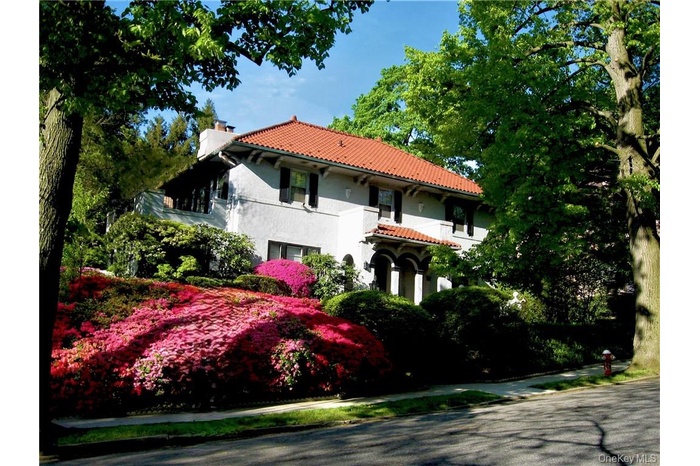 Mediterranean / spanish-style house featuring a balcony