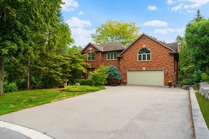 Dreams do come true ! Tucked into a picturesque, tree lined 0.