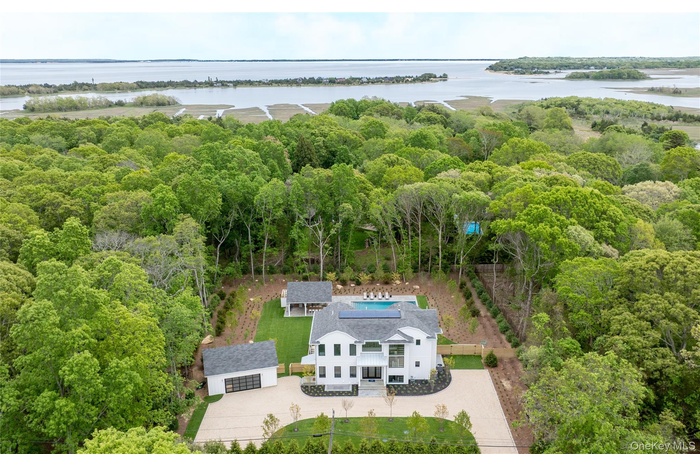 Aerial view of Property and Surrounding Area Showing Proximity to Beach
