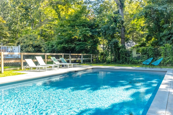 Outdoor pool with a patio area