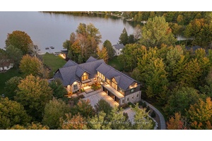 Perched on the shores of Lake Eugenia and minutes from Beaver Valley Ski Club, this 8, 100 sq.