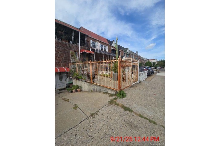 Gate with a residential view