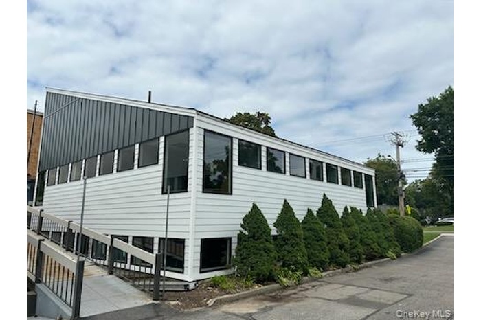View of side of property with board and batten siding