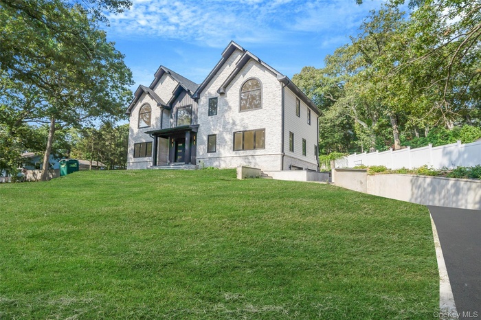 View of front of property with stone siding
