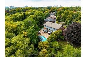 Say yes to the absolute best ; this Markland Wood mid century modern home is the pinnacle of style and comfort with unique details and a timeless aesthetic.
