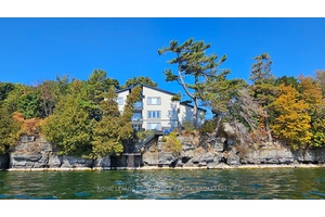 Welcome to your dream home on the shores of Lake Ontario where stunning design meets serene natural beauty.