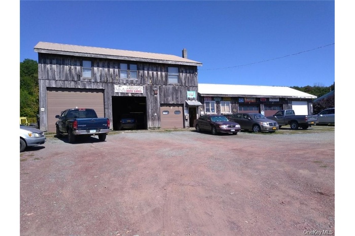 View of front of property with a garage