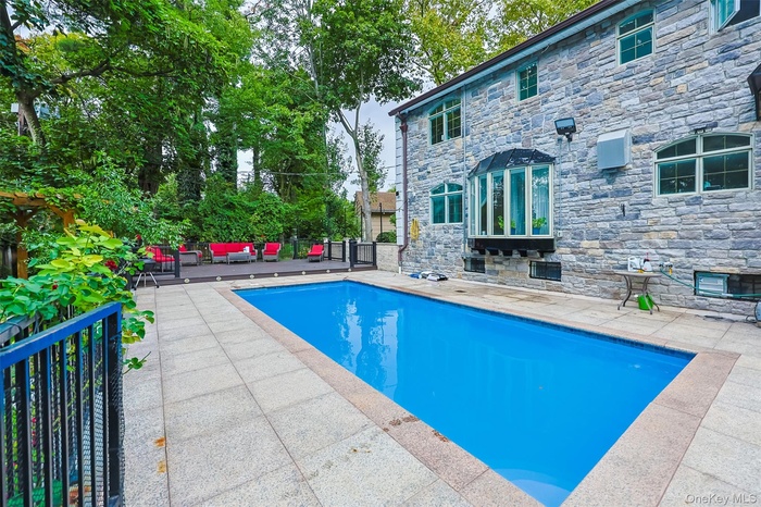 Swimming pool featuring a patio