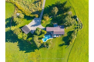 A truly exceptional luxury estate set on 50 acres of rolling hills, serene fields, and breathtaking landscapes.
