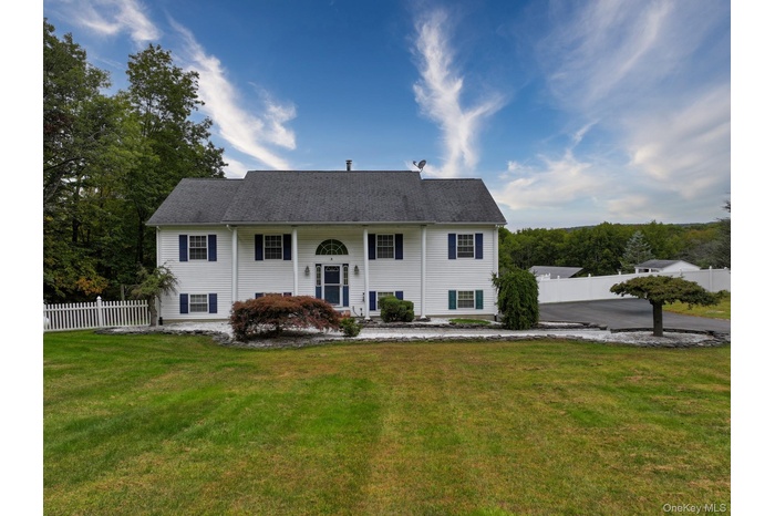 Split foyer home with a porch