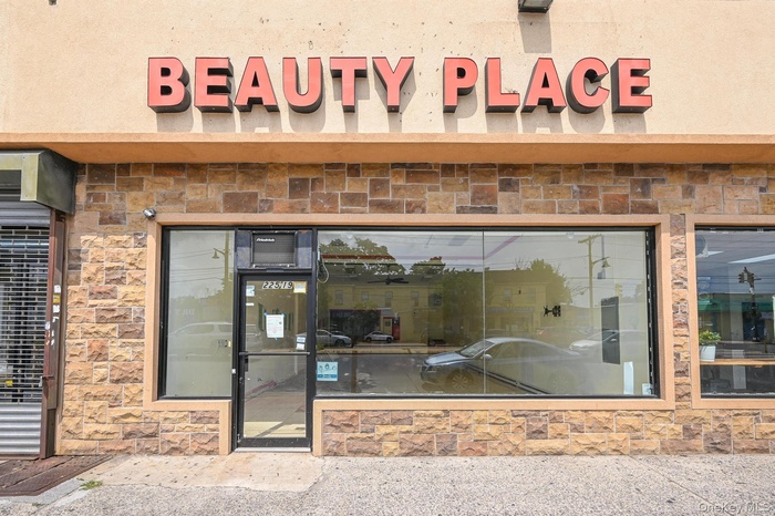 Entrance to property with stone siding