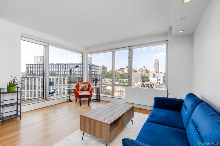 Living area featuring a view of city