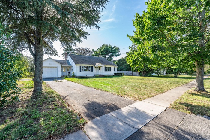 View of front of property featuring driveway