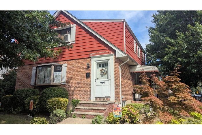 View of front of home with brick siding