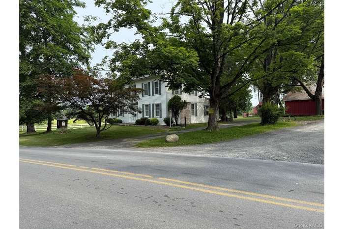 View of front of property featuring a front yard