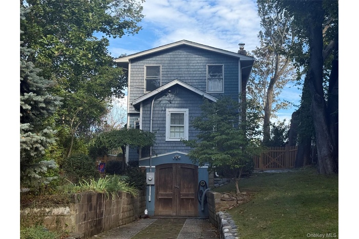 View of front facade with a chimney